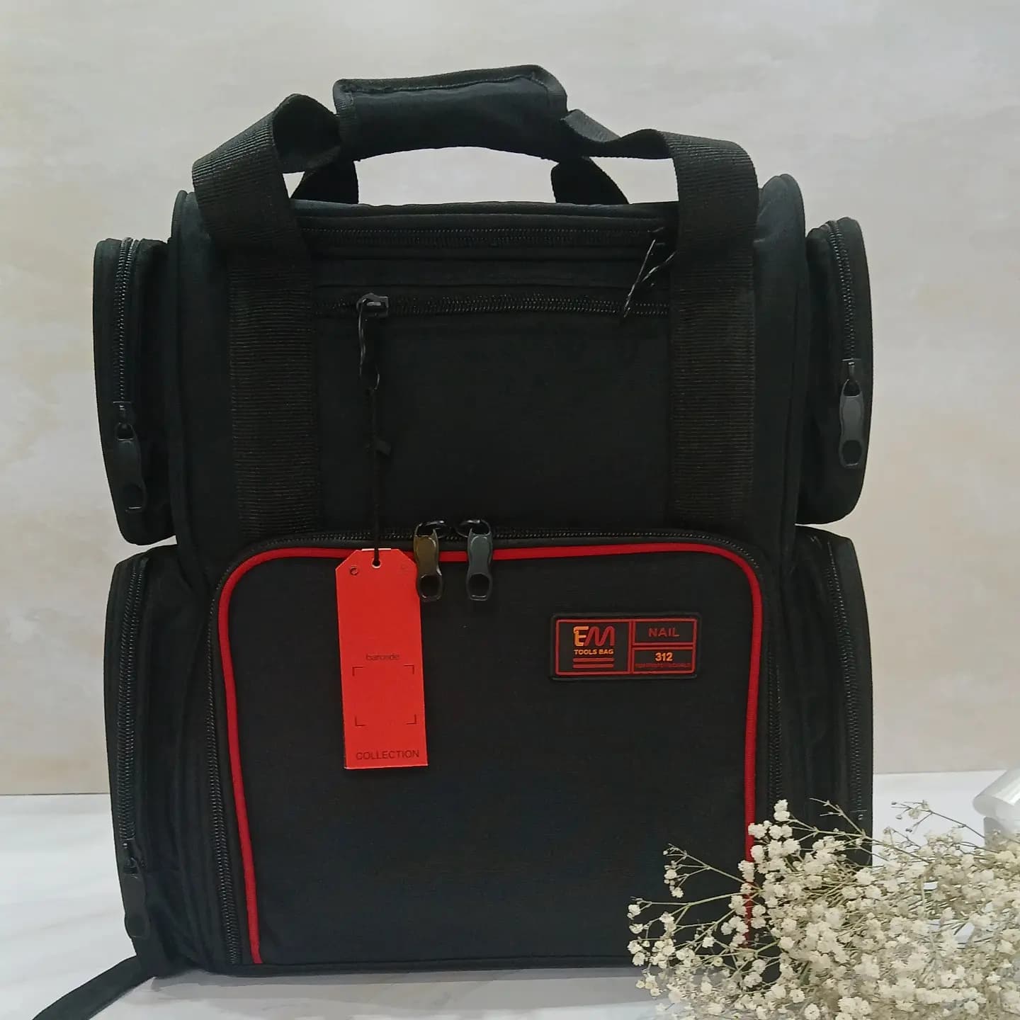 کیف ابزار آرایشگاهی برزنتی کوله ای مقسم دار کد 312 ای ام E.M