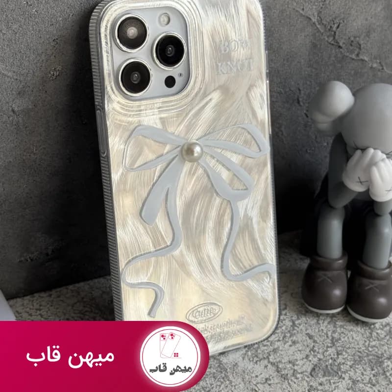 قاب موبایل آیفون بونات پاپیون شاینی نقره ای تک مروارید - کد (۷۶۲۰۸)